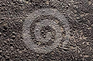 Old black plaster wall texture.