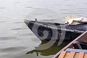 Old black pleasure boat. Lake and Albufera Natural Park El Parque Natural de la Albufera de Valencia