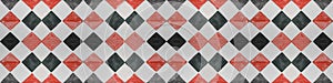 Old black red white vintage shabby patchwork mosaic tiles wallpaper stone concrete cement wall texture background banner, with