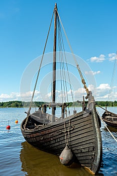 Old black sloop made of wood