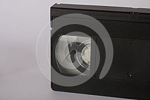 Old Black VHS Video Tape, cassette on a white background, overhead flat lay. VHS tapes used for reproduction of movies