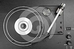 An old black vinyl record player.