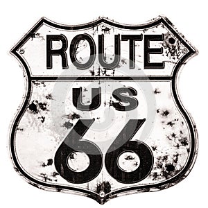 an old black and white us 66 sign against a white background