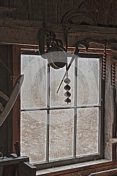 Old Blacksmith Shop Window and Vintage Tools