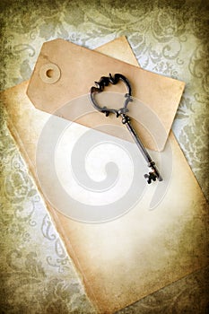 Old blank paper and key