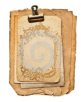 Old blank paper sheets with golden ornament