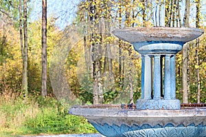 Old blue abandoned fountain