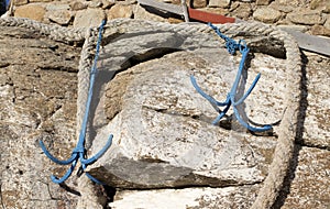 Old blue boat anchors