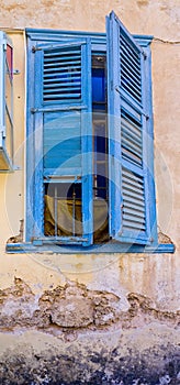 Old Blue broken shutter in Neve Tzedek