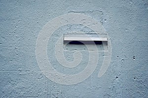 Old blue building wall on the street