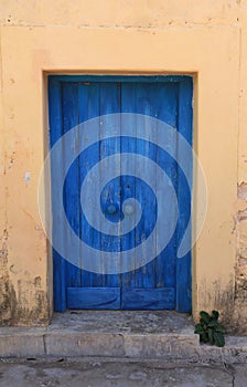 Old blue door in ancient building