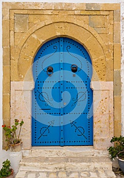 Old Blue door with arch from Tunisia