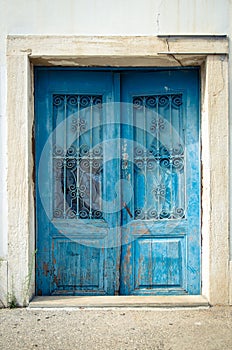 Old blue door closed