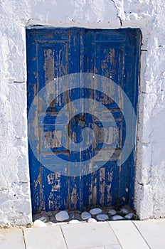 Old blue door on Santorini island, Greece