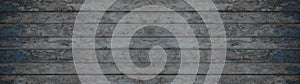 Old blue gray grey painted exfoliate rustic wooden boards texture - wood background banner panorama long shabby