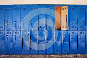 Old blue lockers with door open