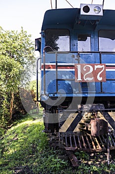 Old blue locomotive with Costa Rican flag colors