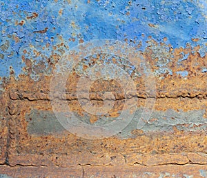 Old blue metal case with rust in the welds photo