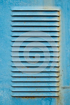 Old blue metal ventilation grille