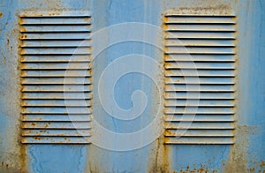Old blue metal ventilation grille