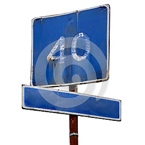 Old blue road sign on a white isolated background