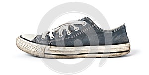 Old blue sneaker isolated on white background