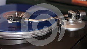 old blue vinyl record with clipping path. DJ Turntable with Vinyl Record  Playing  Top View.