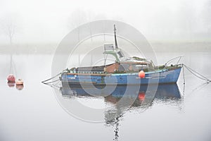 Old boat derelict on River Leven in Dumbarton