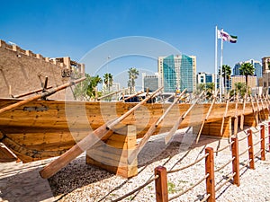 Old boat on display near fahidi fort at Dubai Museum, UAE