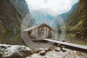 Old boat house at Lake Obersee in summer, Bavaria, Germany