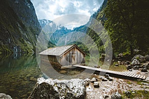 Old boat house at Lake Obersee in summer, Bavaria, Germany photo