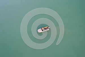 Old boat on the lake, view from above