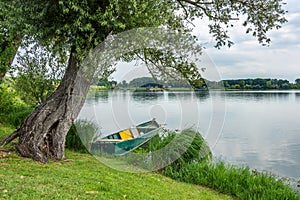 Old boat on the mantova lake