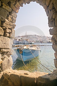 Old boat at Paros island in Greece. View from inside the Kastelli castle.