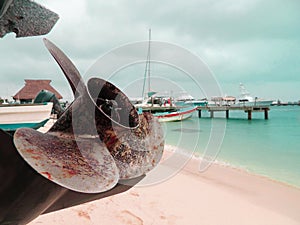 Old boat  Propeller on a beach view