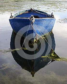 Old boat and reflexion