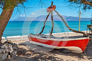 Old boat on the shore. Kissamos, Crete, Greece