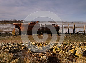 Old Boat shipwreck at sunset