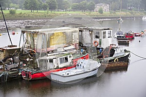 Old boats derelict on River Leven in Dumbarton