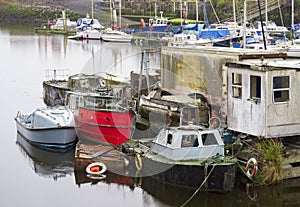 Old boats derelict on River Leven in Dumbarton