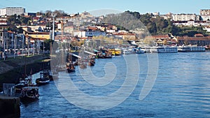Old boats on the Duoro river in Porto
