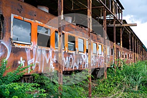 Old bogey of retired train left in the railway station photo