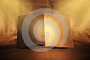 Old book in ambient light