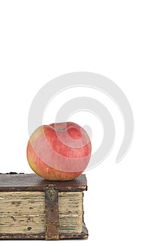 Old book and apple
