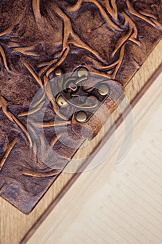Old book and diary on wooden table