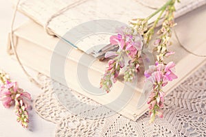 Old book and flowers