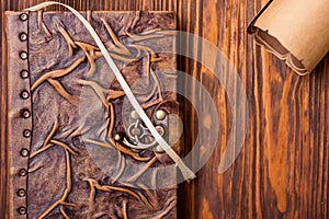 Old book and letter on wooden table