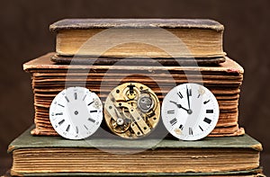 Old books and antique clock faces, storytelling background