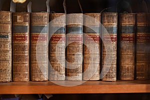 old books background, shelf with books, old library, antique books