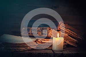 Old books and candle. photo